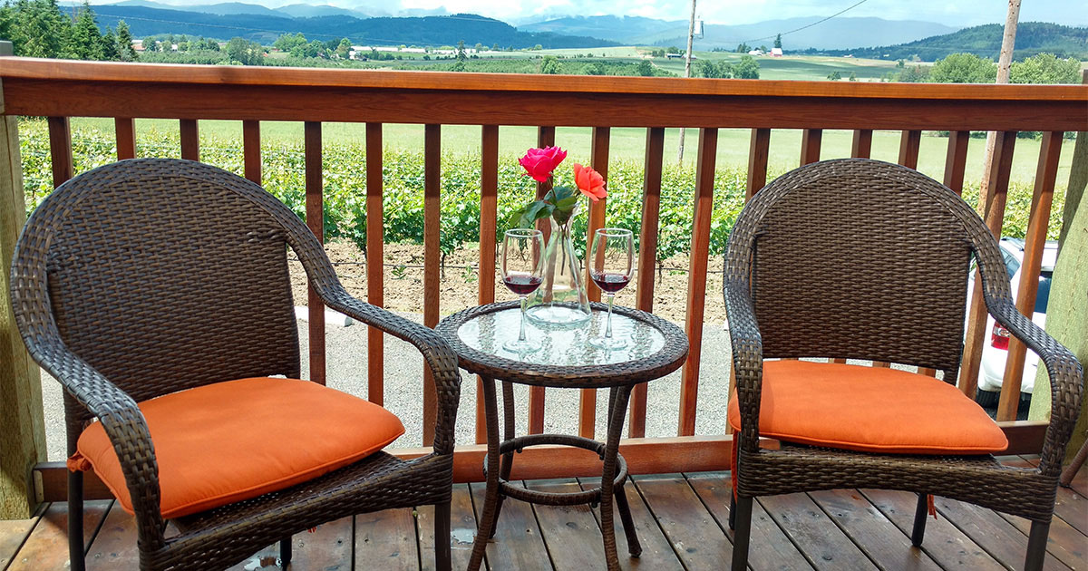 Two glasses, two roses, and the best seat in the house.